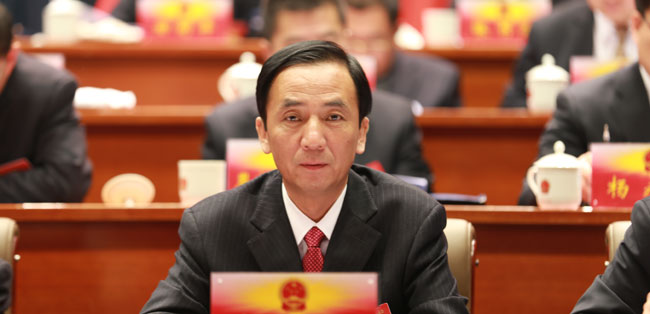旗政协主席李银成在主席台就座